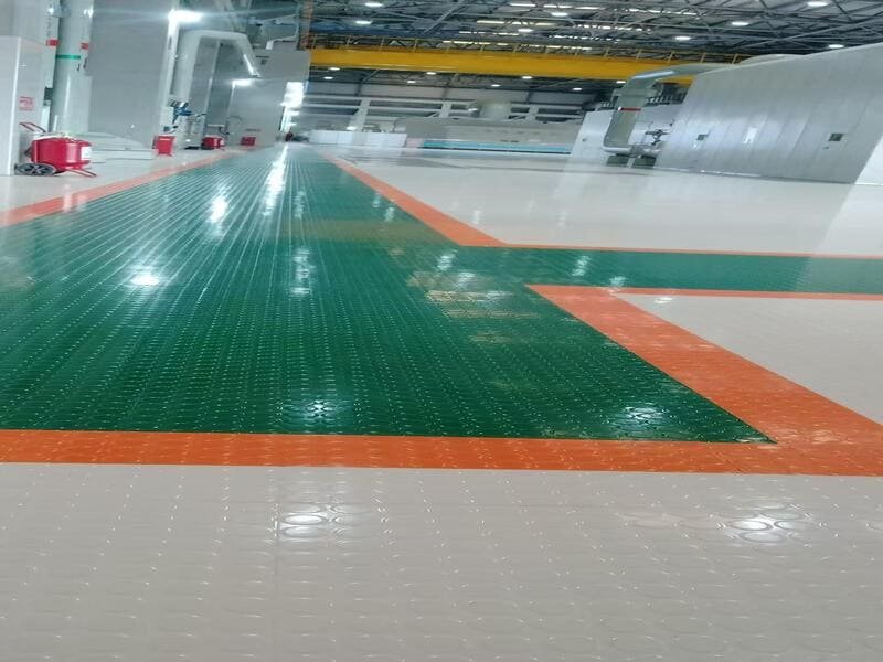Detailed cross-section view of a multi-layer PVC roll flooring structure